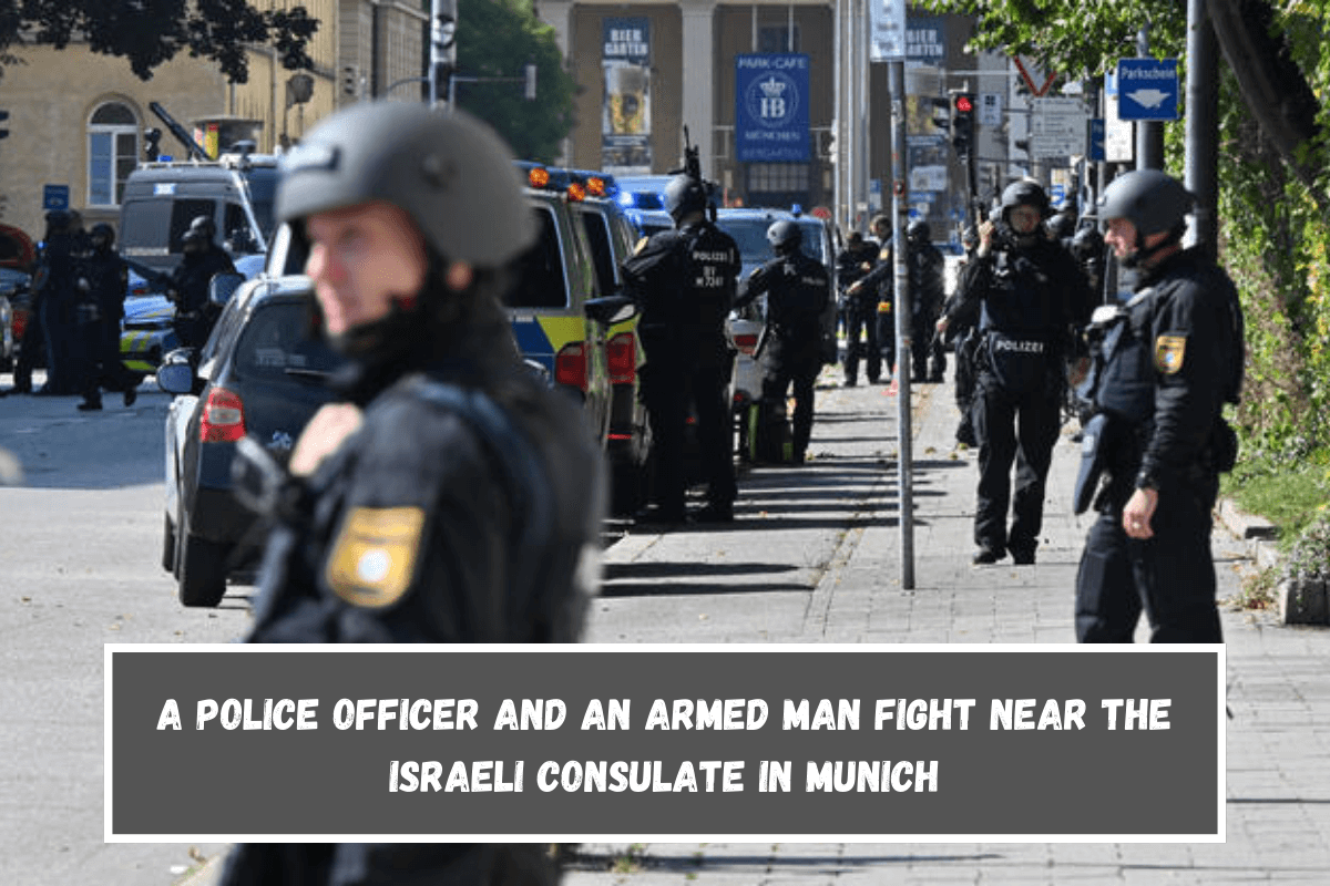 A police officer and an armed man fight near the Israeli Consulate in Munich