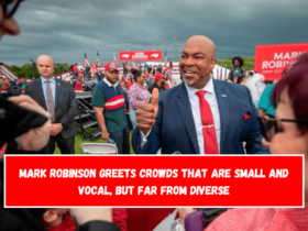 Mark Robinson greets crowds that are small and vocal, but far from diverse