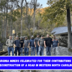 West Virginia miners celebrated for their contributions to the reconstruction of a road in western North Carolina