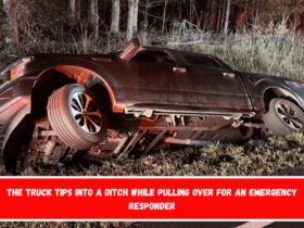 The truck tips into a ditch while pulling over for an emergency responder