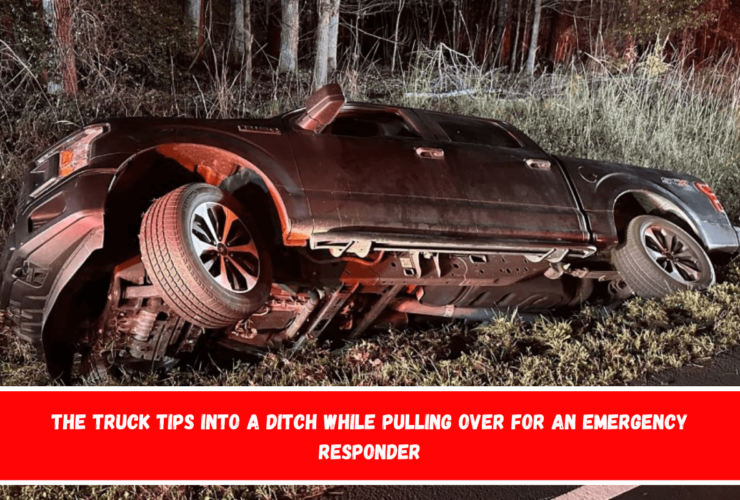 The truck tips into a ditch while pulling over for an emergency responder