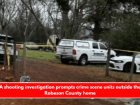 A shooting investigation prompts crime scene units outside the Robeson County home