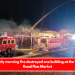 An early morning fire destroyed one building at the Webb Road Flea Market