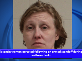 Wisconsin woman arrested following an armed standoff during a welfare check.