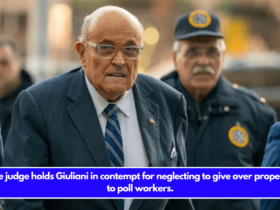 The judge holds Giuliani in contempt for neglecting to give over property to poll workers.